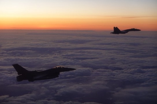 NORAD Intercepts Russian Bomber and Fighter Jets Near Alaska 14 NORAD